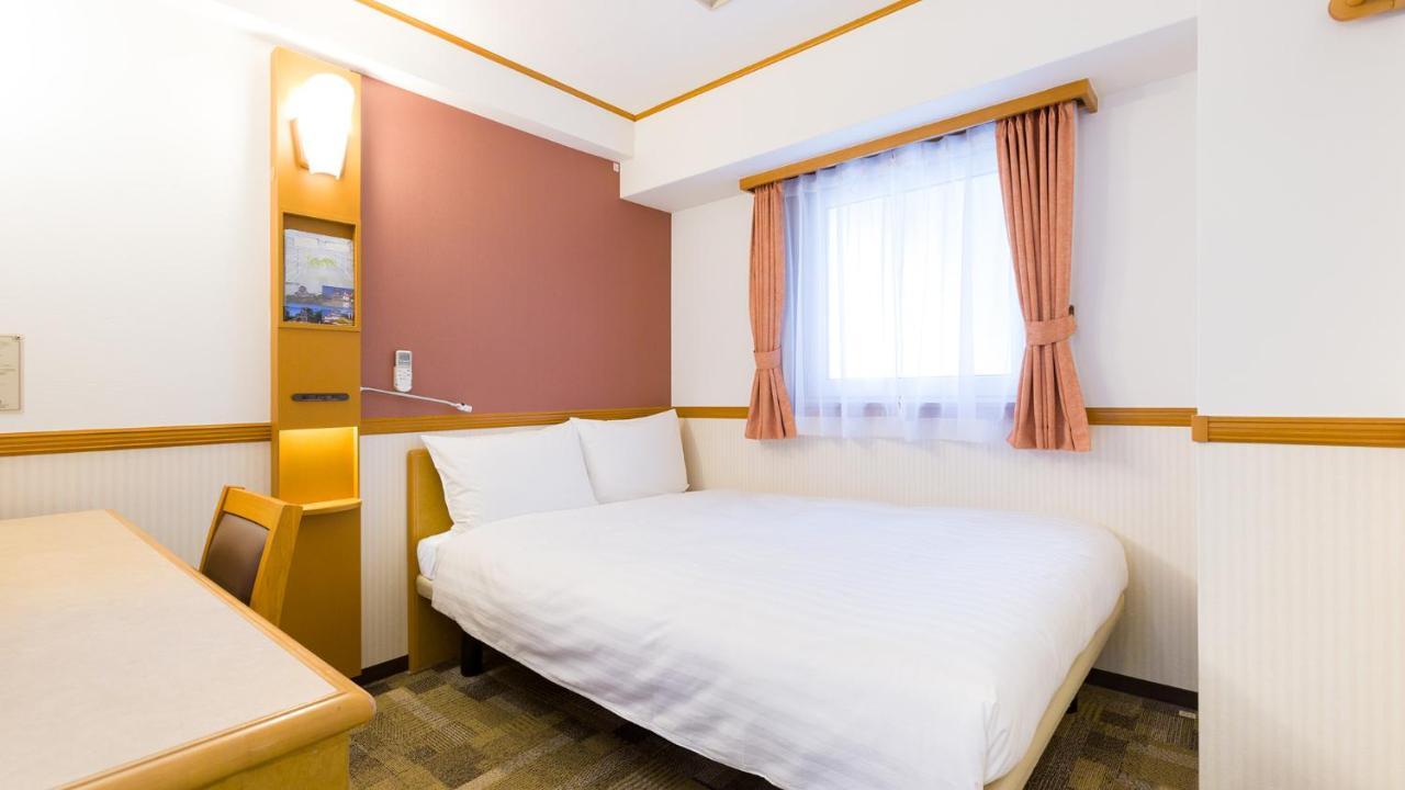 Toyoko Inn Tokyo Shinagawa-Eki Takanawa-Guchi Extérieur photo
