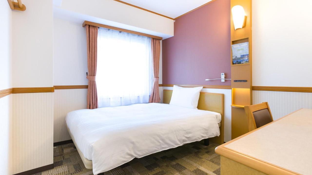 Toyoko Inn Tokyo Shinagawa-Eki Takanawa-Guchi Extérieur photo