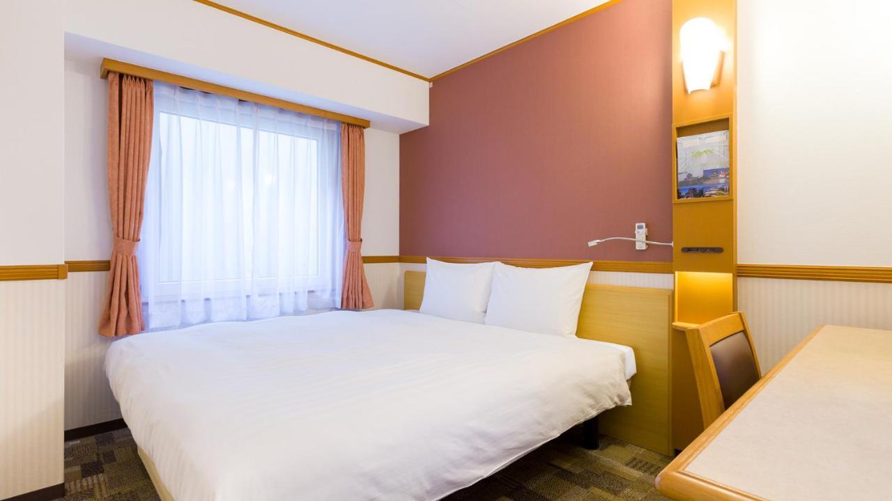 Toyoko Inn Tokyo Shinagawa-Eki Takanawa-Guchi Extérieur photo