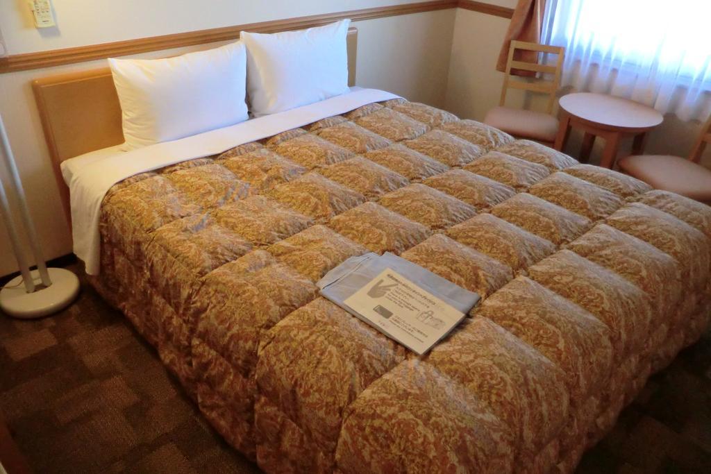 Toyoko Inn Tokyo Shinagawa-Eki Takanawa-Guchi Extérieur photo