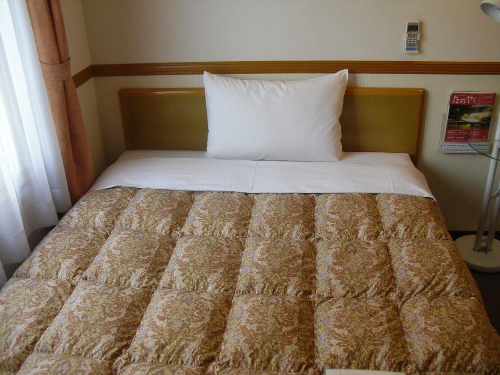Toyoko Inn Tokyo Shinagawa-Eki Takanawa-Guchi Extérieur photo