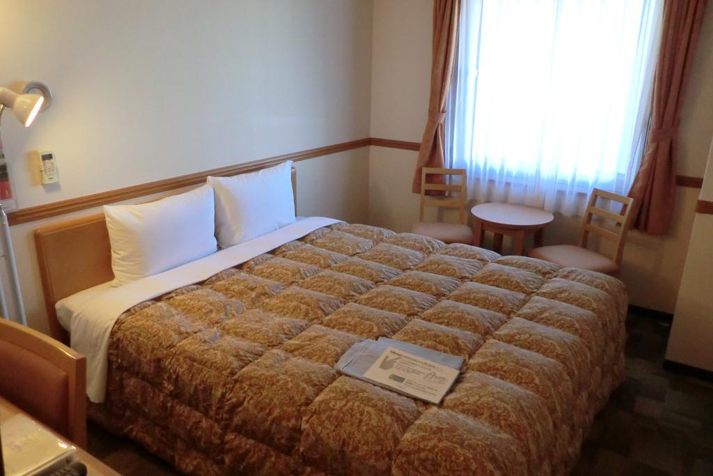 Toyoko Inn Tokyo Shinagawa-Eki Takanawa-Guchi Extérieur photo